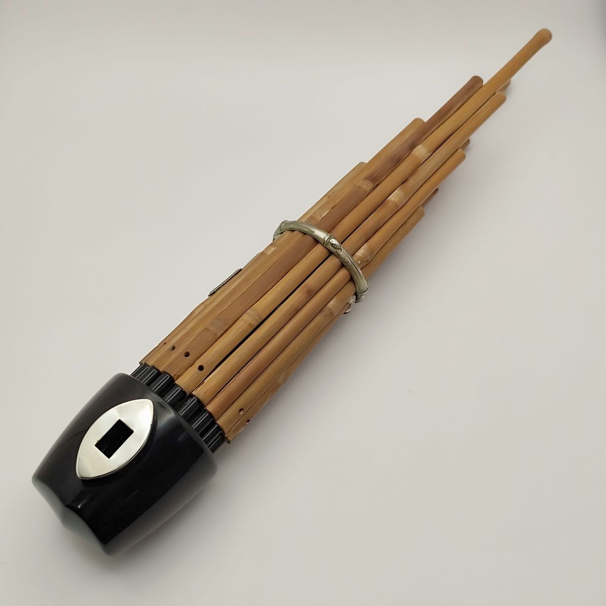 Traditional Japanese sho mouth organ with bamboo pipes, boxed, on a Japanese auction listing
